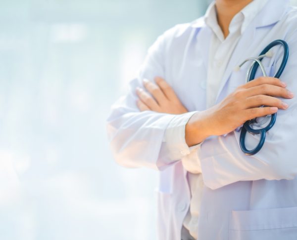 Portrait,Doctor,With,A,Stethoscope,Stands,Confidently,Ready,To,Provide